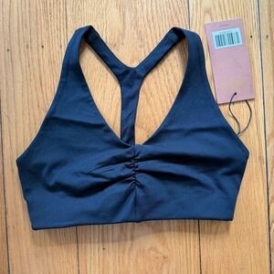 NWT girlfriend collective t back sports back with ruched front size XS